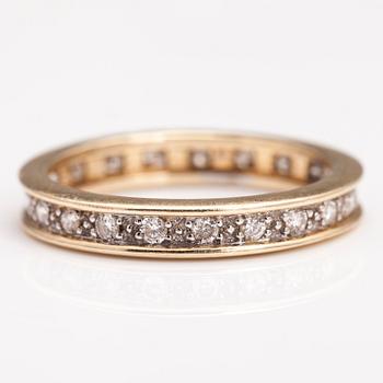 A 14K gold ring with diamonds ca. 0.21 ct in total. Timantttiset, Helsinki 2002.