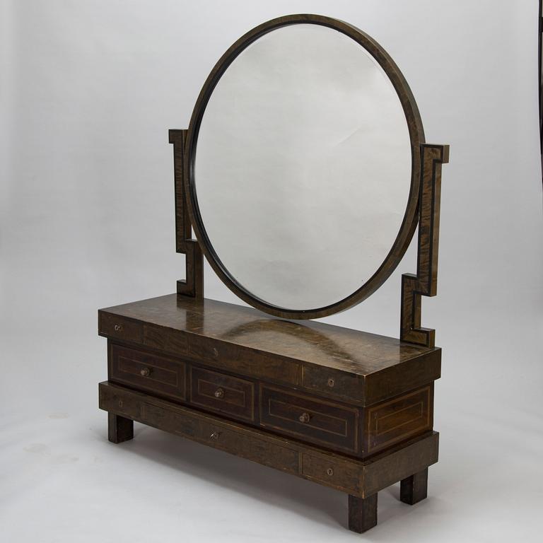 A 1930's dressing table and a stool.