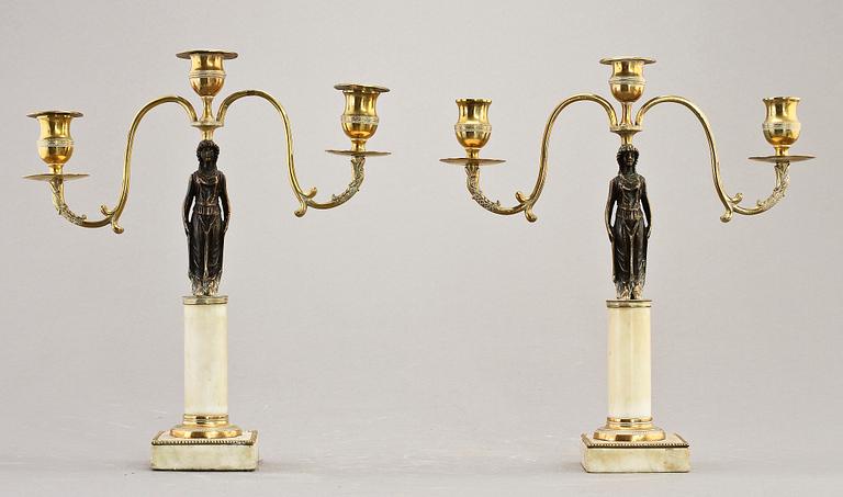 KANDELABRAR, ett par, delvis sengustavianska, 1800-tal.