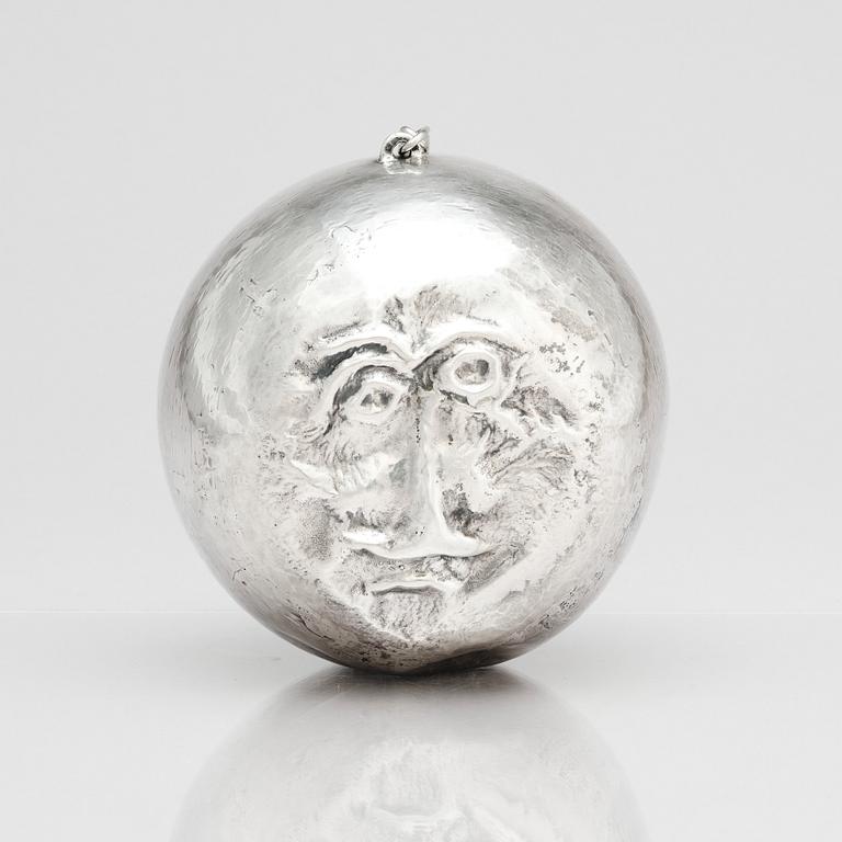 Olle Ohlsson, a silver 'man in the moon' sculpture, Stockholm.