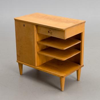 A cabinet / radio table model 3205 for Asko Finland, designed 1948.