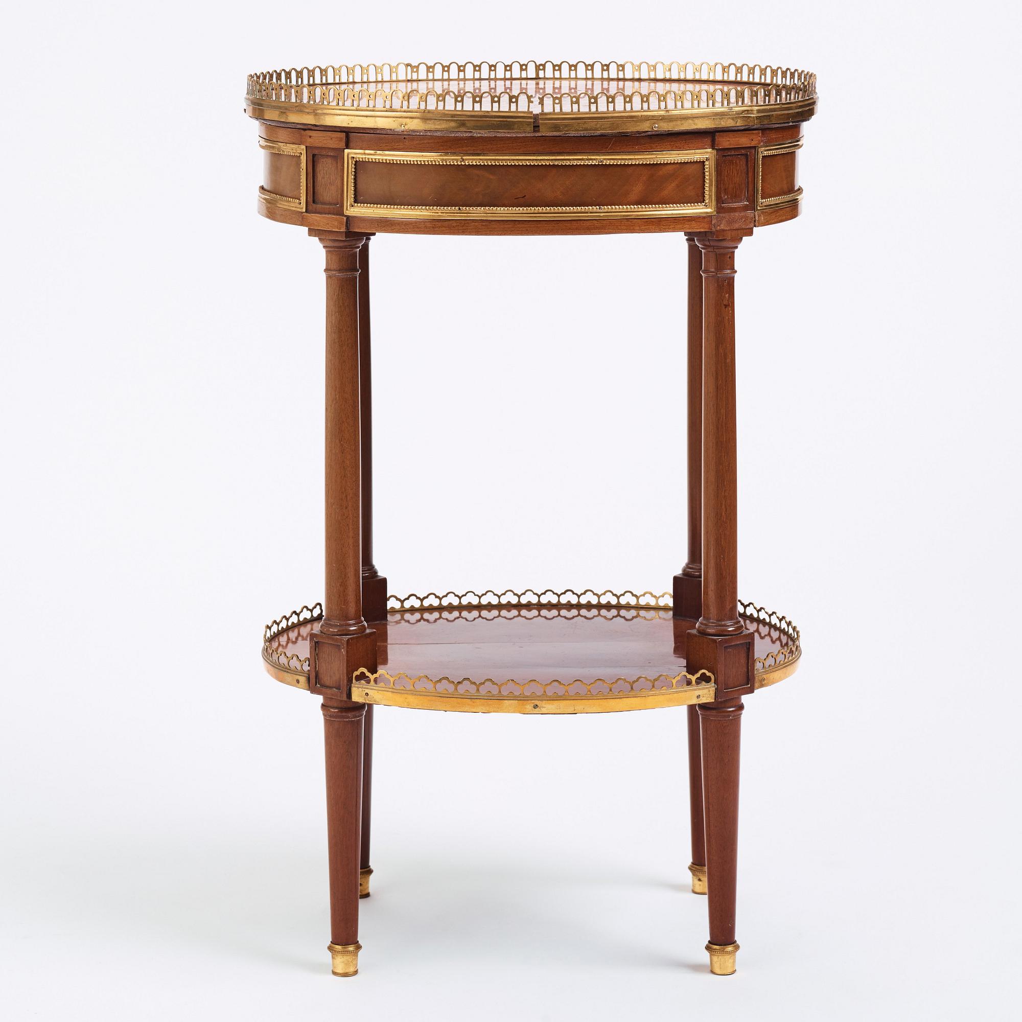A Louis XVI mahogany and ormolu-mounted table signed Roger Vandercruse Lacroix 'RVLC' (master in Paris 1755-1799).