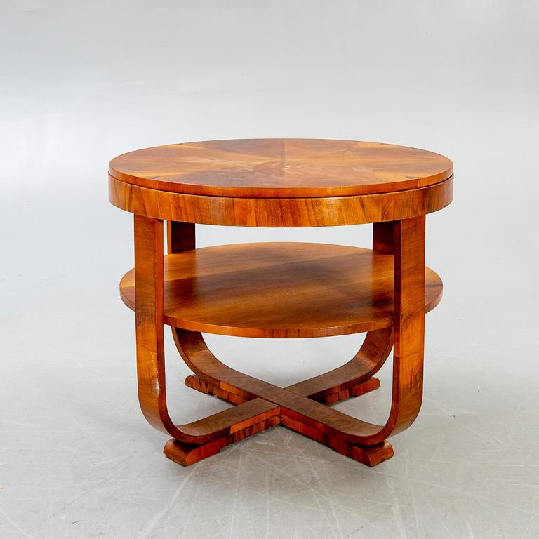 An Art Deco style walnut coffee table later part of the 20th century.