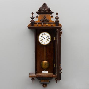 A neo renaissance German Junghans wall clock from around the turn of the 20th Century.