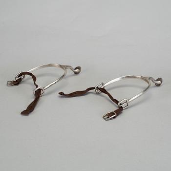 A pair of silver spurs by Carl Gustaf Blomborg in Stockholm(active 1812-1841). Total weight c. 120 gram.