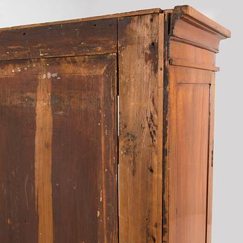 An Empire cabinet, circa 1810.