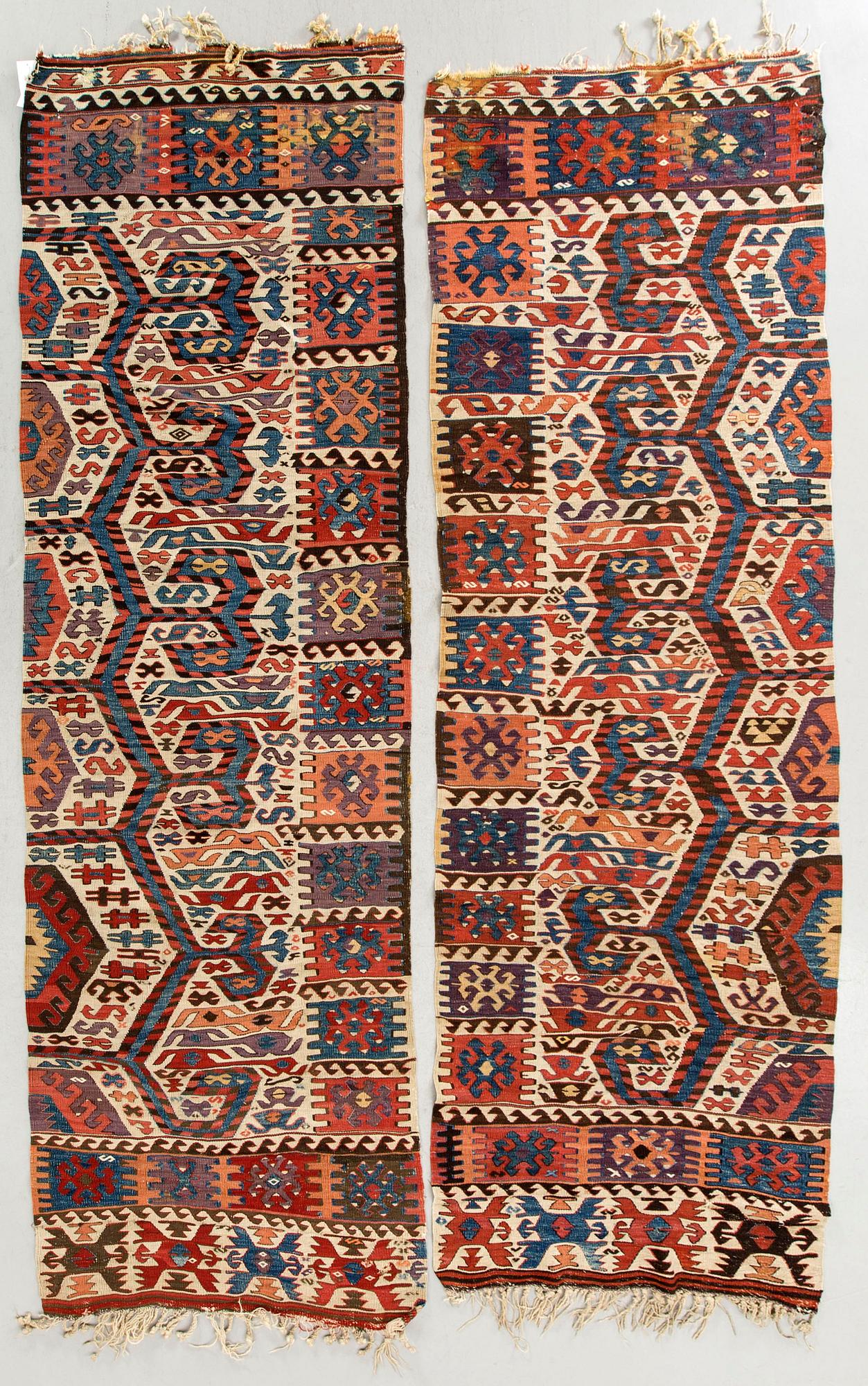 A pair of antique Karman Anatolia Kilims ca 277 x 87 and 261 x 84 cm.