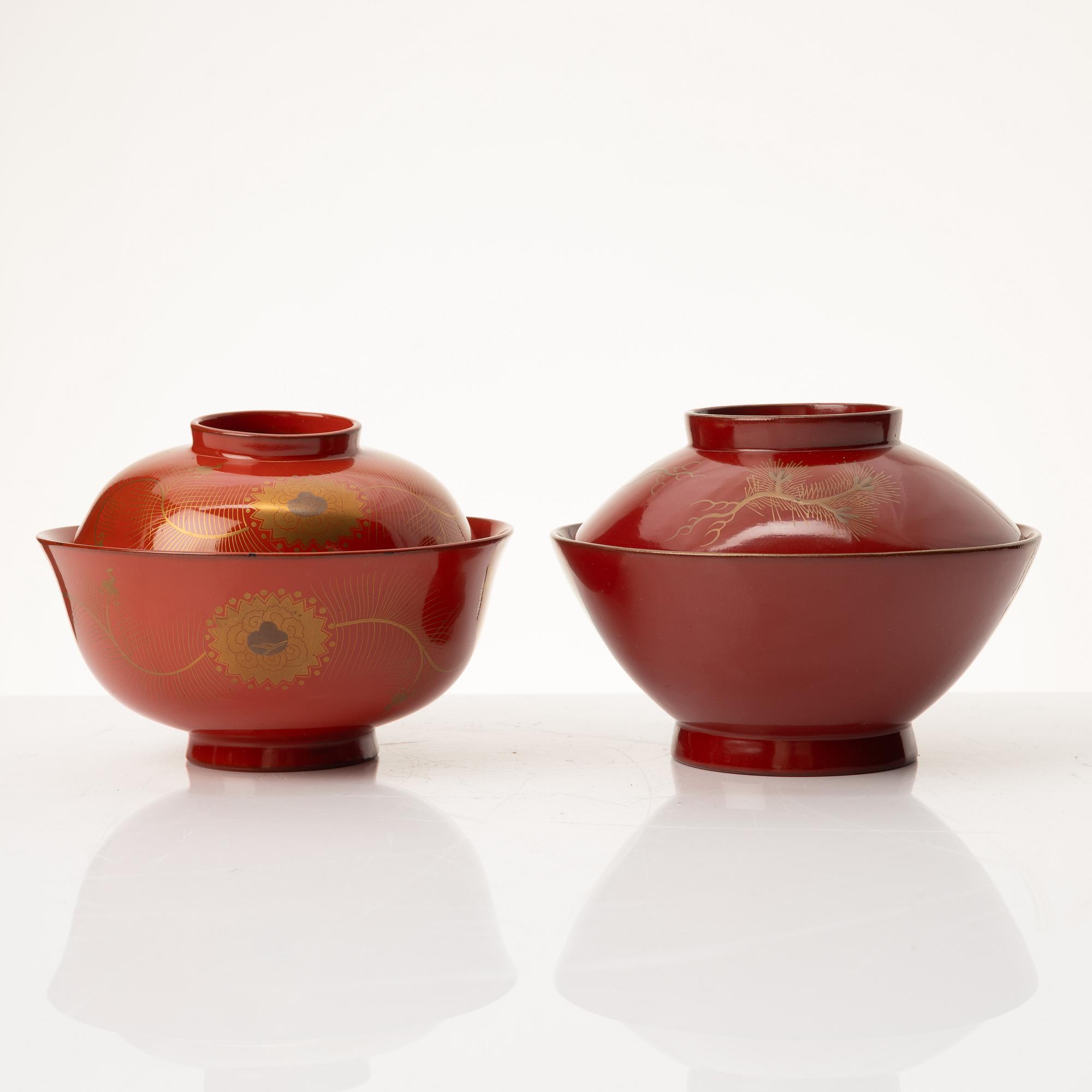A group of nine Japanese lacquer bowls with covers, Meiji and 20th century.