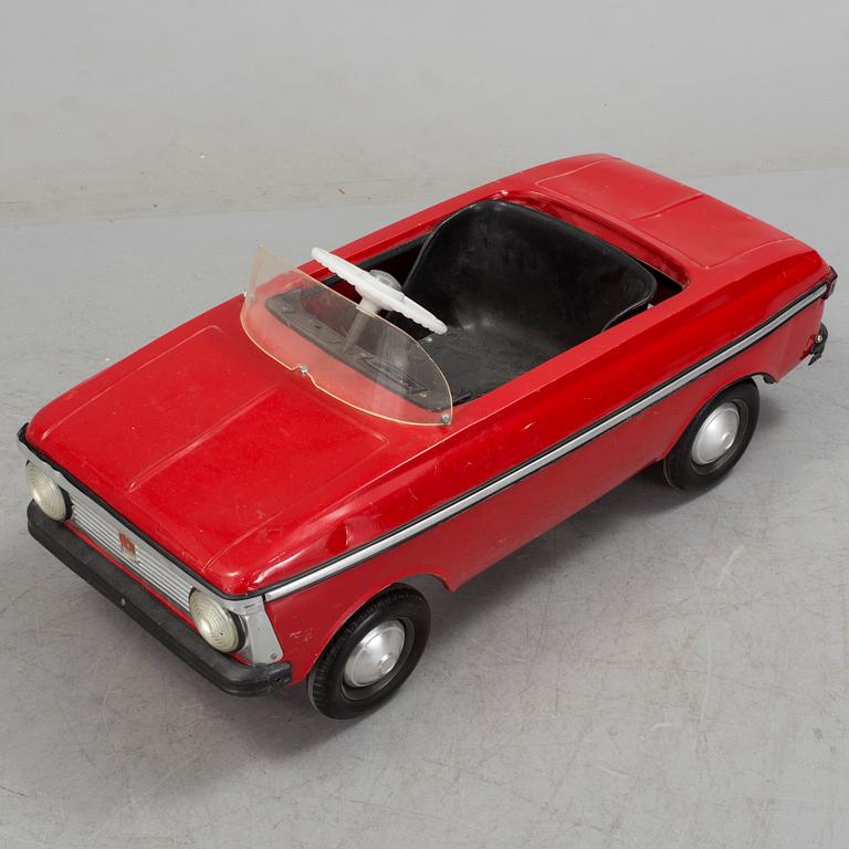 A pedal car from the 1970's.