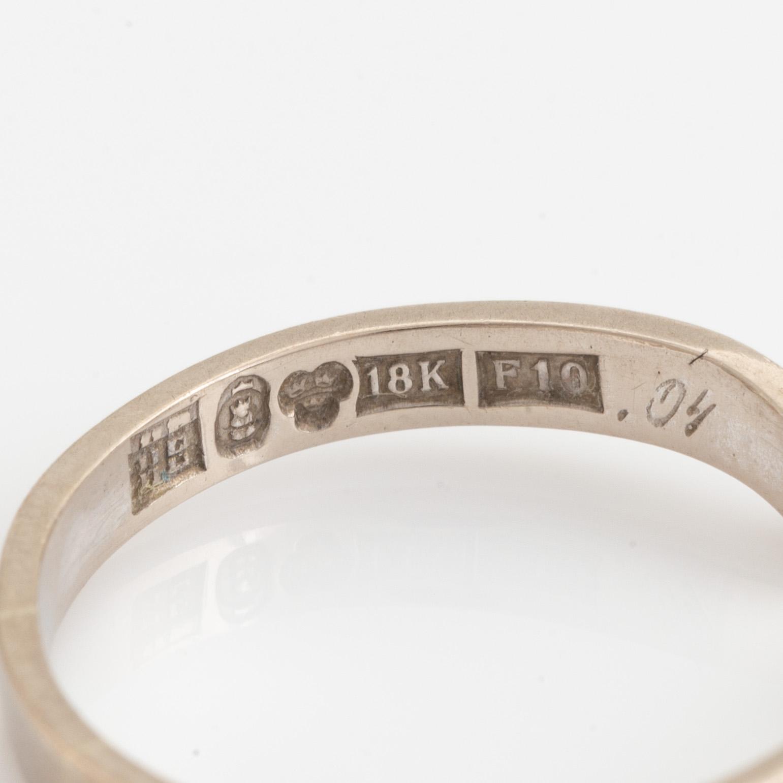 Stigbert, ring, 18K vitguld med små briljantslipade diamanter.