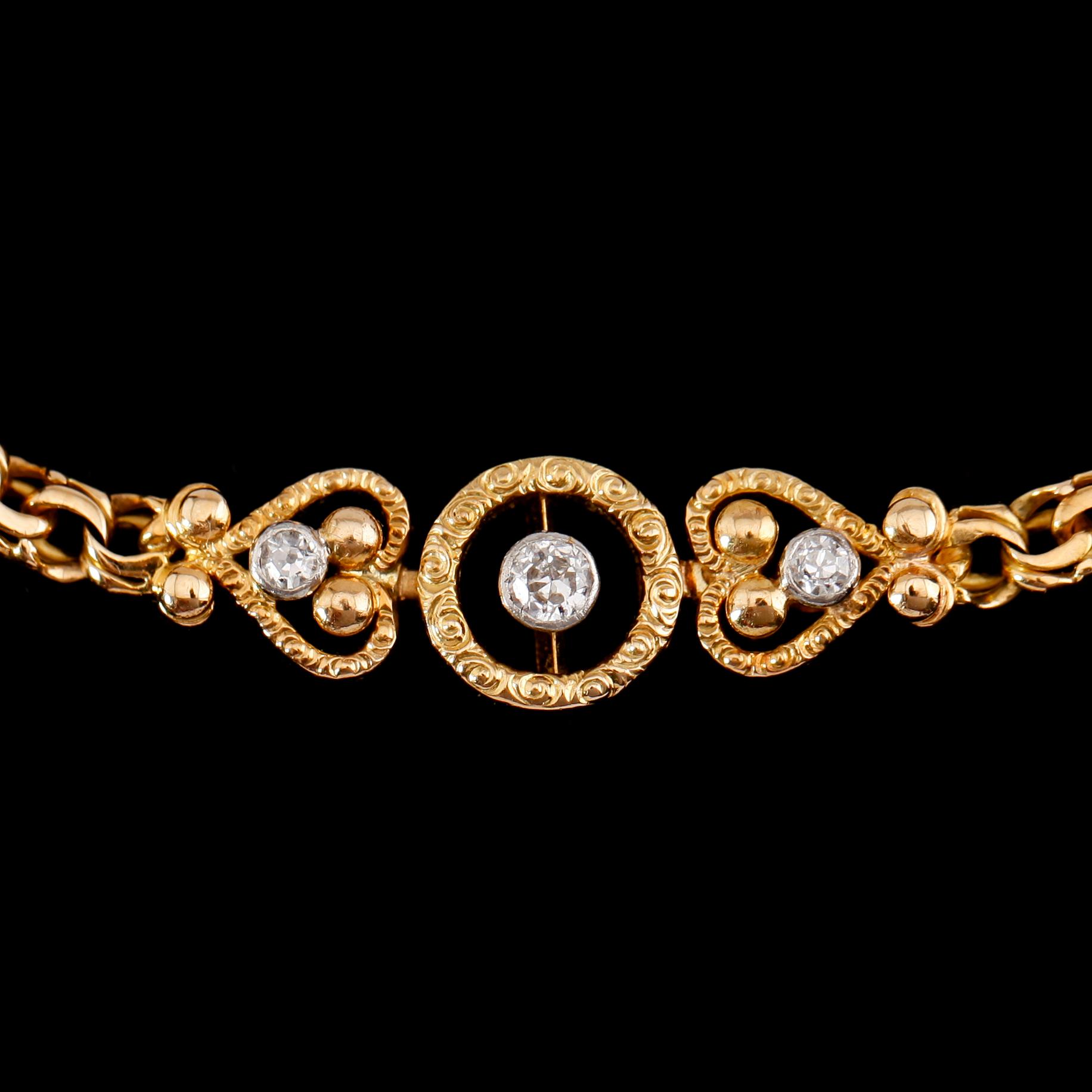 ARMBAND, 18 k guld, med 3 briljanter, daterad 1920. Vikt ca 12 gram.