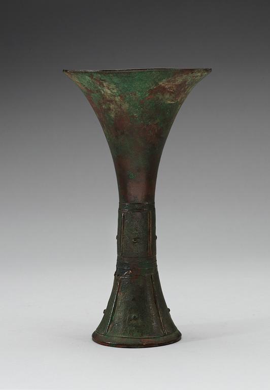 A archaistic bronze vase, with taotie pattern to base, presumably Ming dynasty.