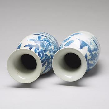 A large pair of blue and white vases, Qing dynasty, 19th Century.