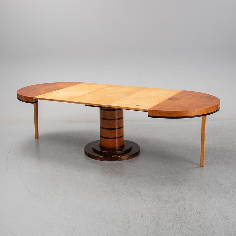 An elm veneered dining table, 1930's/40's.