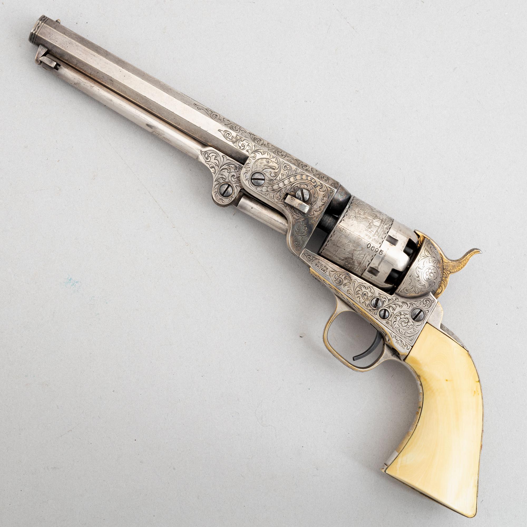 A percussion revolver, Colt 1851 Navy, in case, from the year 1863.