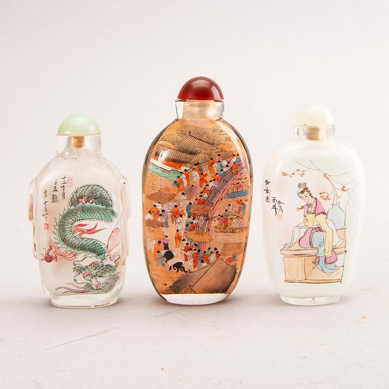 A set of seven different metal and glass snuff bottles 20th century.