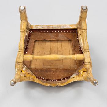 A Swedish painted and carved rococo armchair, later part of the 18th century.