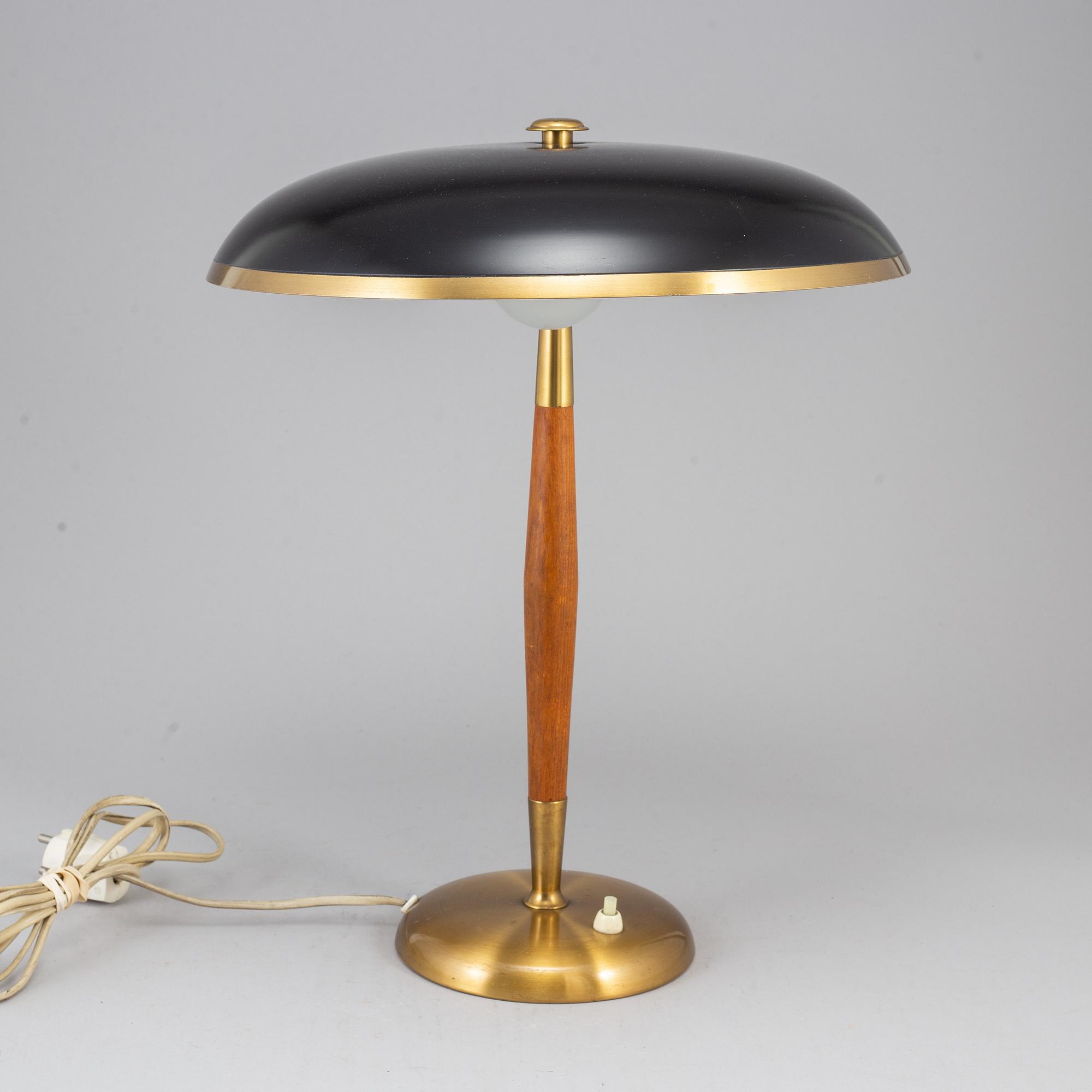 A Boréns brass and teak table lamp. Borås, Sweden mid 20th century.