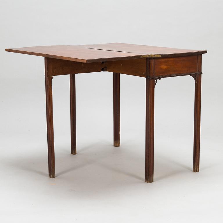 A Gustavian card table around 1800.