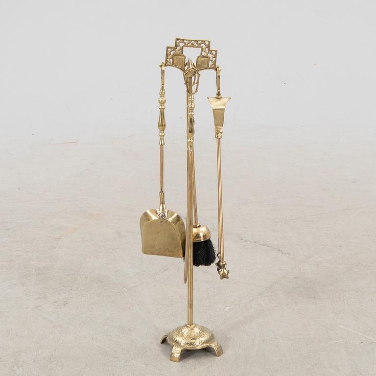 A late 20th century English brass fire tools.