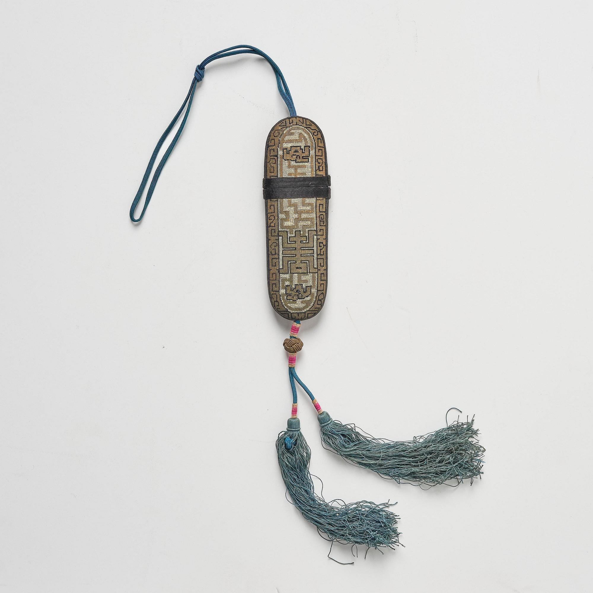 A set of three embroidered purses/ eye-glass cases, Qing dynasty, 19th century.