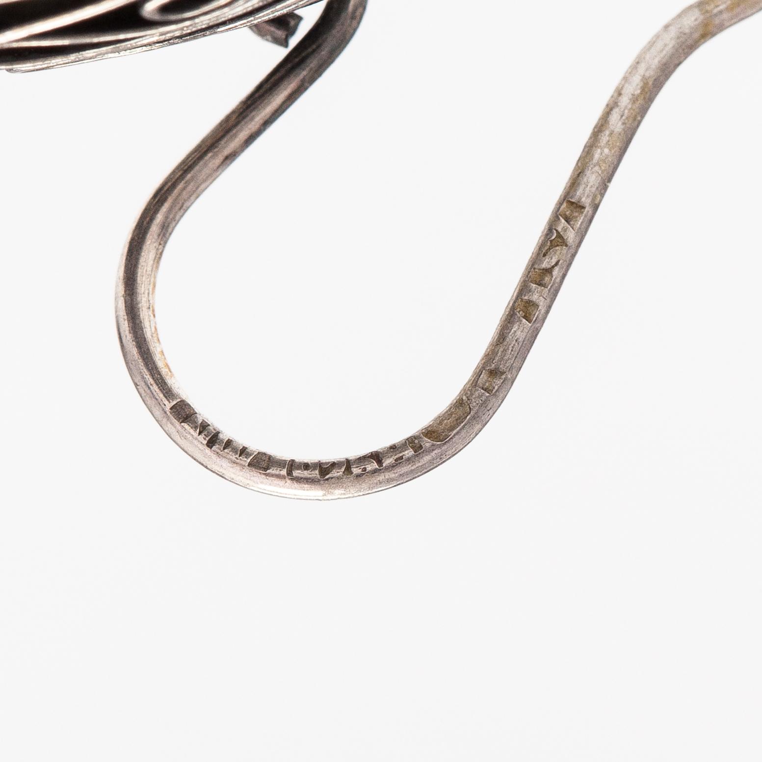 Liisa Vitali, "Kissantassut", a pari of sterling silver earrings and a ring. Westerback, Helsinki 1971.