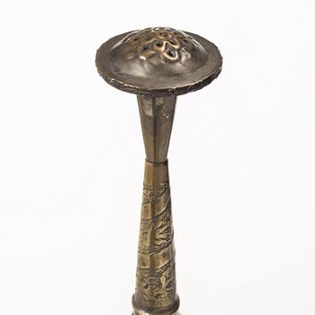 An 20th century british Raj repoussé metal rosewater sprinkler.