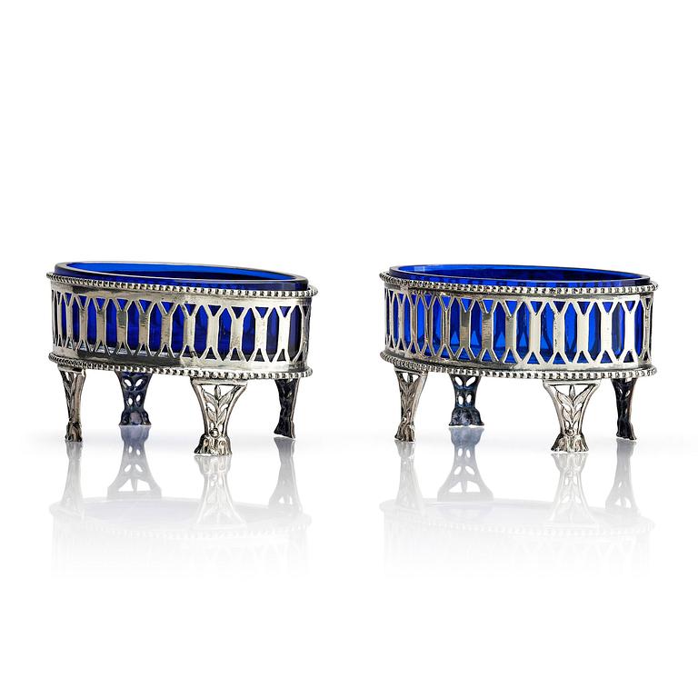 A pair of Swedish Gustavian 18th century silver and blue glass salt-cellars, marks of Olof Sedin, Gävle 1793.
