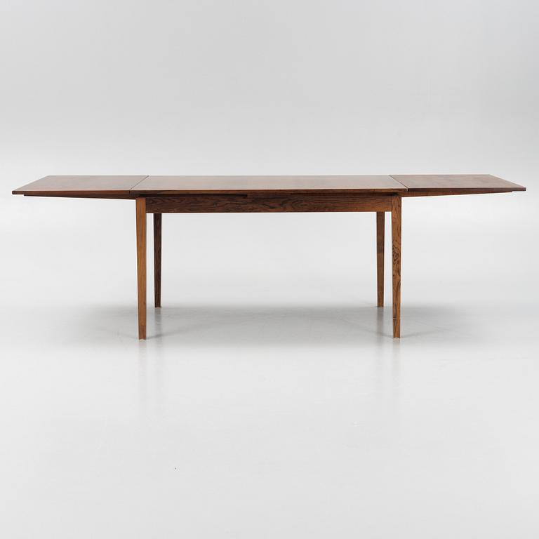 A Danish Dining Table and Six Chairs, 1960s.