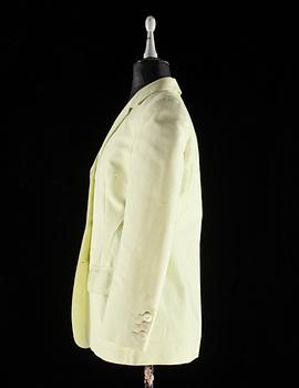 A lime-green cotton suit by Gucci.