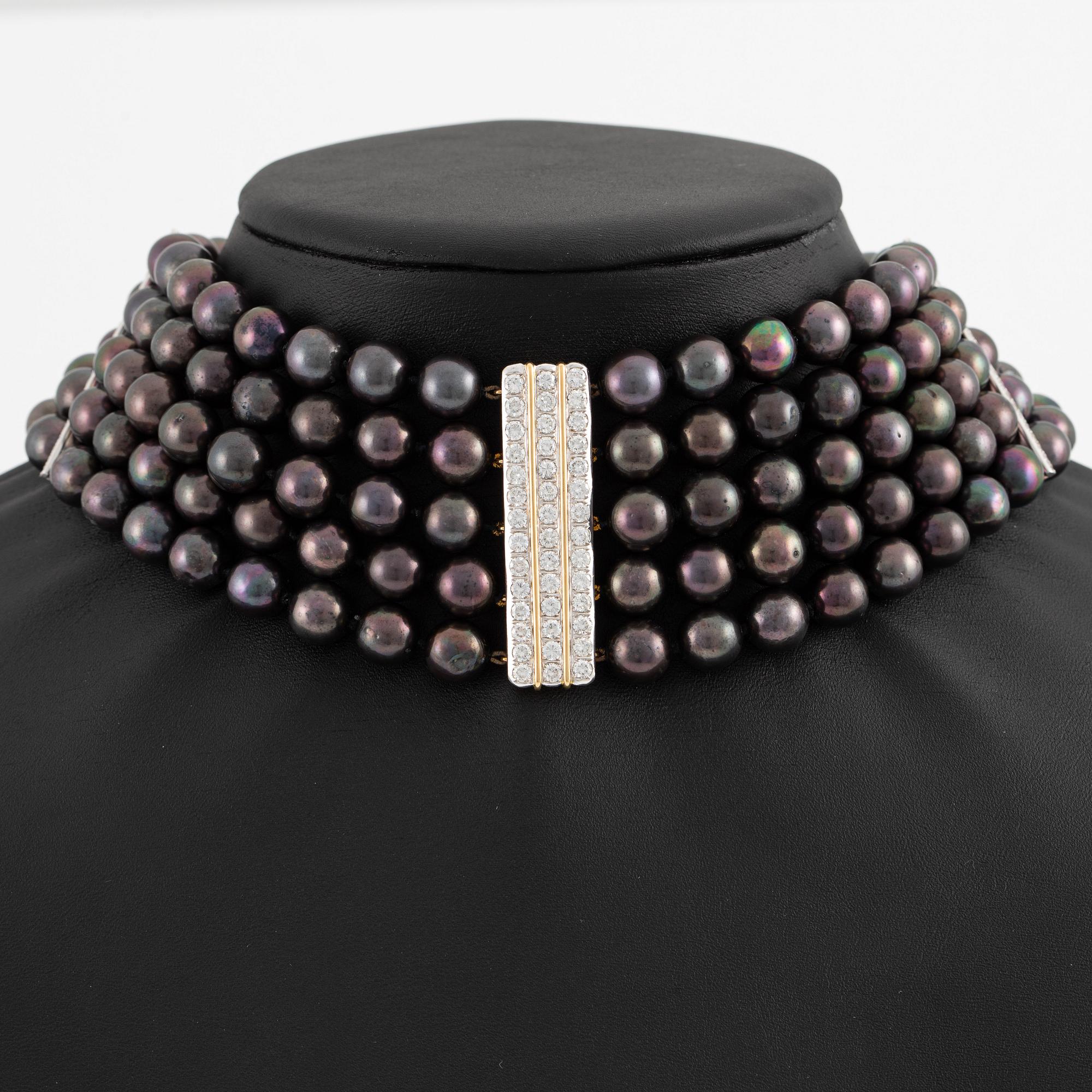 Necklace, five-row with cultured black pearls, 18K gold and white gold with brilliant-cut diamonds.