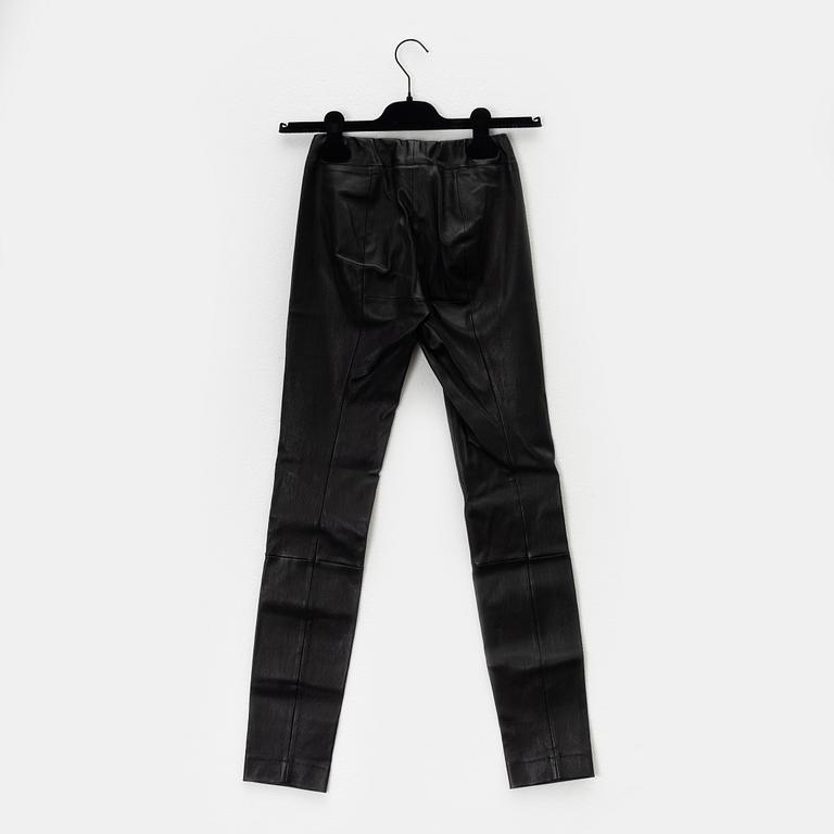 The Row, a pair of leather pants, size XS.