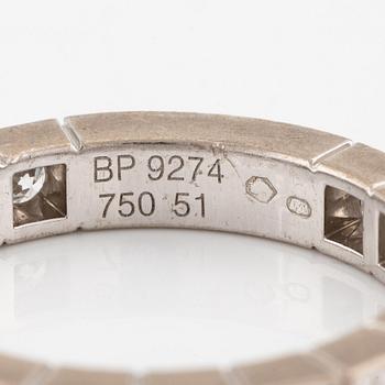 An 18K white gold Cartier ring set with round brilliant-cut diamonds.