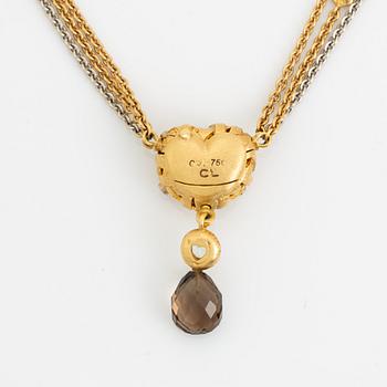 Ole Lynggaard, Charlotte Lynggaard, lås flätat hjärta med diamanter, collier, nyckelberlock med rökkvarts och akvamarin.