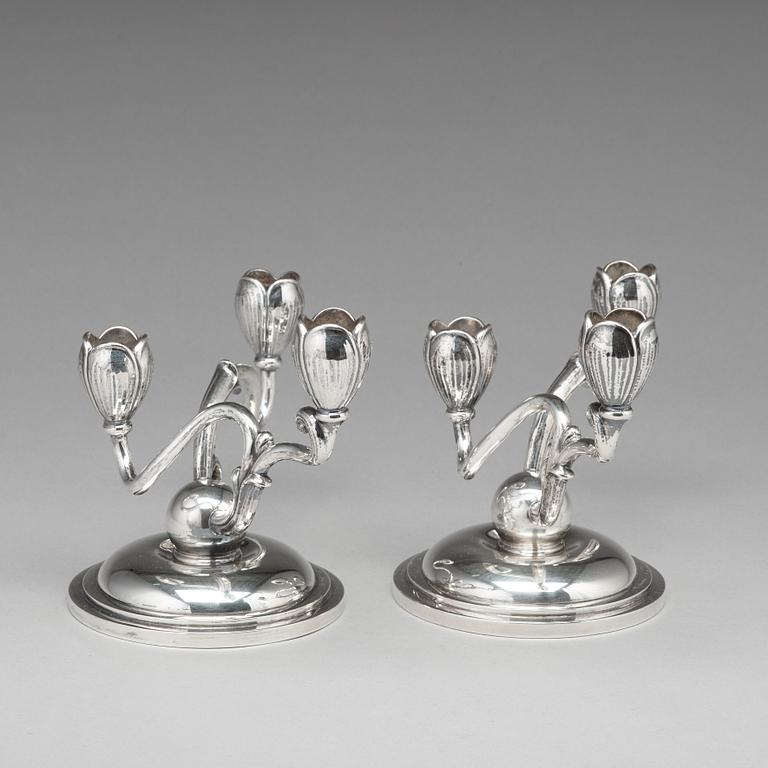 A pair of W.A. Bolin silver candelabra for three lights, Stockholm 1955.