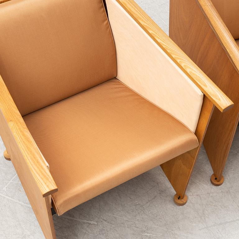 Torbjörn Ahlström, a pair of elm and cherry armchairs.