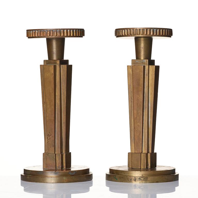 Lars Holmström, a pair of brass candlesticks, Arvika, Swedish Grace, 1920s/30s.