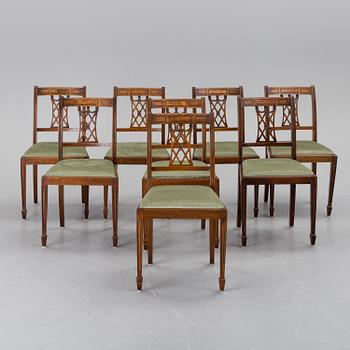 A set of eight chairs and a dining table, second half of the 20th century.