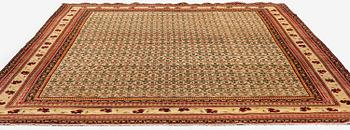 An antique Agra carpet Of Mughal 'Shrub' design, Northern India, c. 335 x 287 cm.