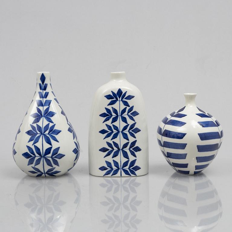 Karin Björquist, a set of nine "Indigo" stoneware vases and bowls, Gustavsbergs studio, 1950s.