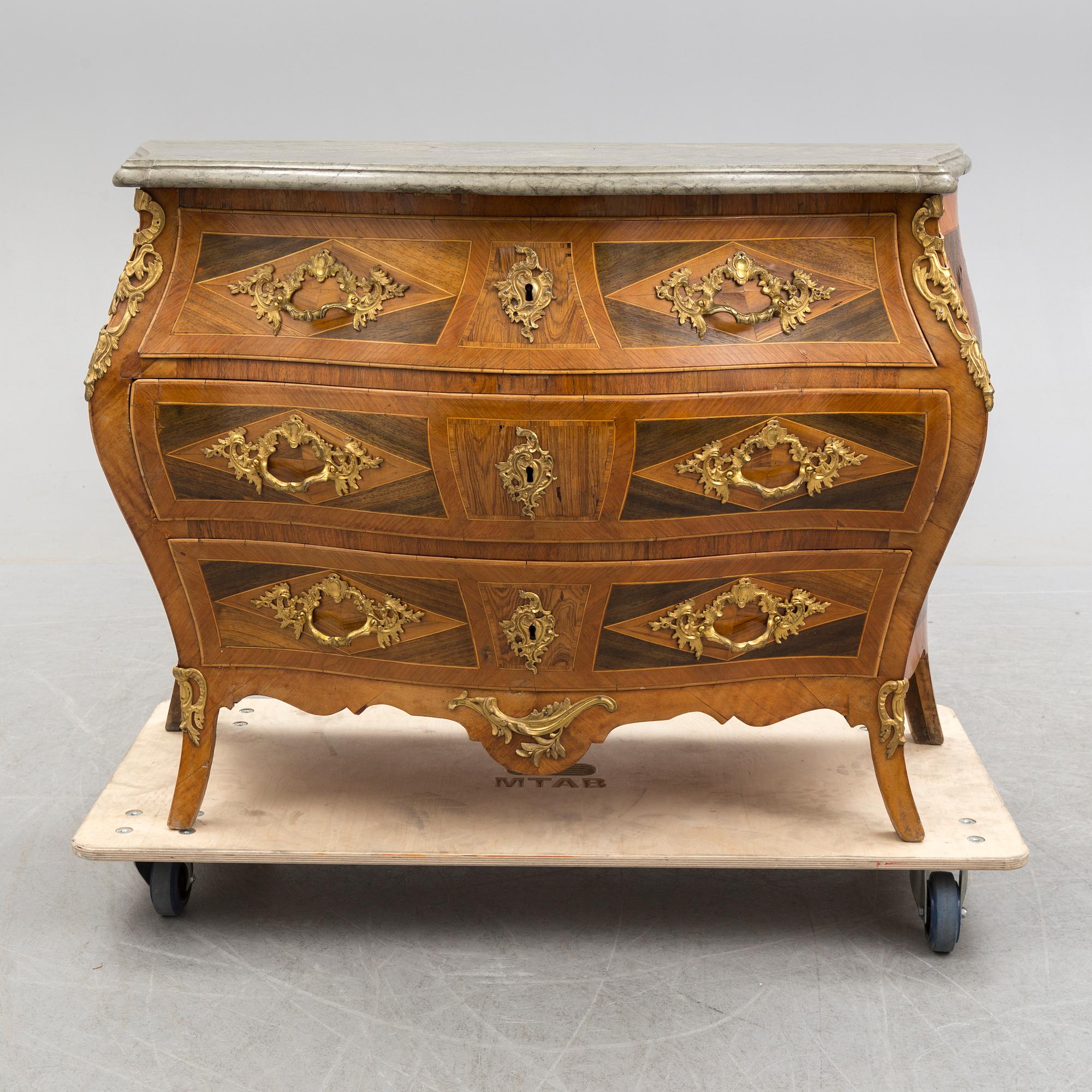 A Swedish Rococo 18th century commode by Gustaf Foltiern (master in Stockholm 1771-1804).