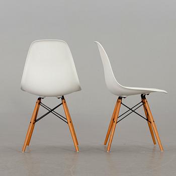 A PAIR OF "PLASTIC CHAIR" BY CHARLES & RAY EAMES, Vitra 2009.