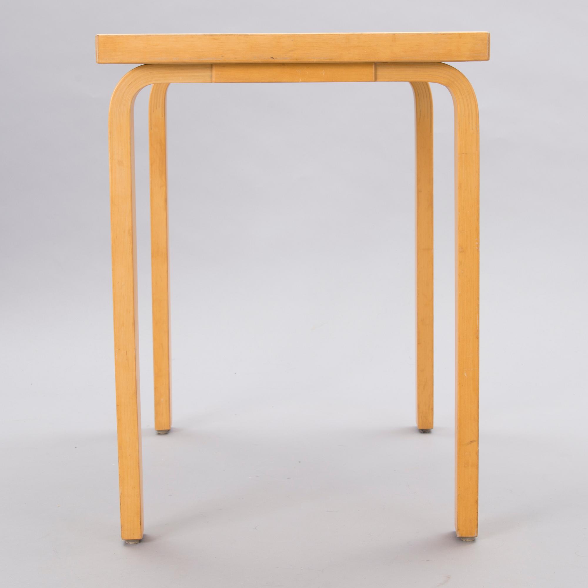 A mid-20th Century table, Artek.
