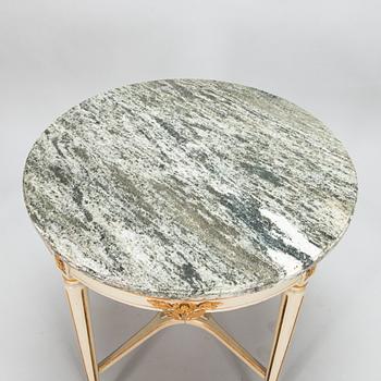 A Gustavian style sofa and table from early 20th century.