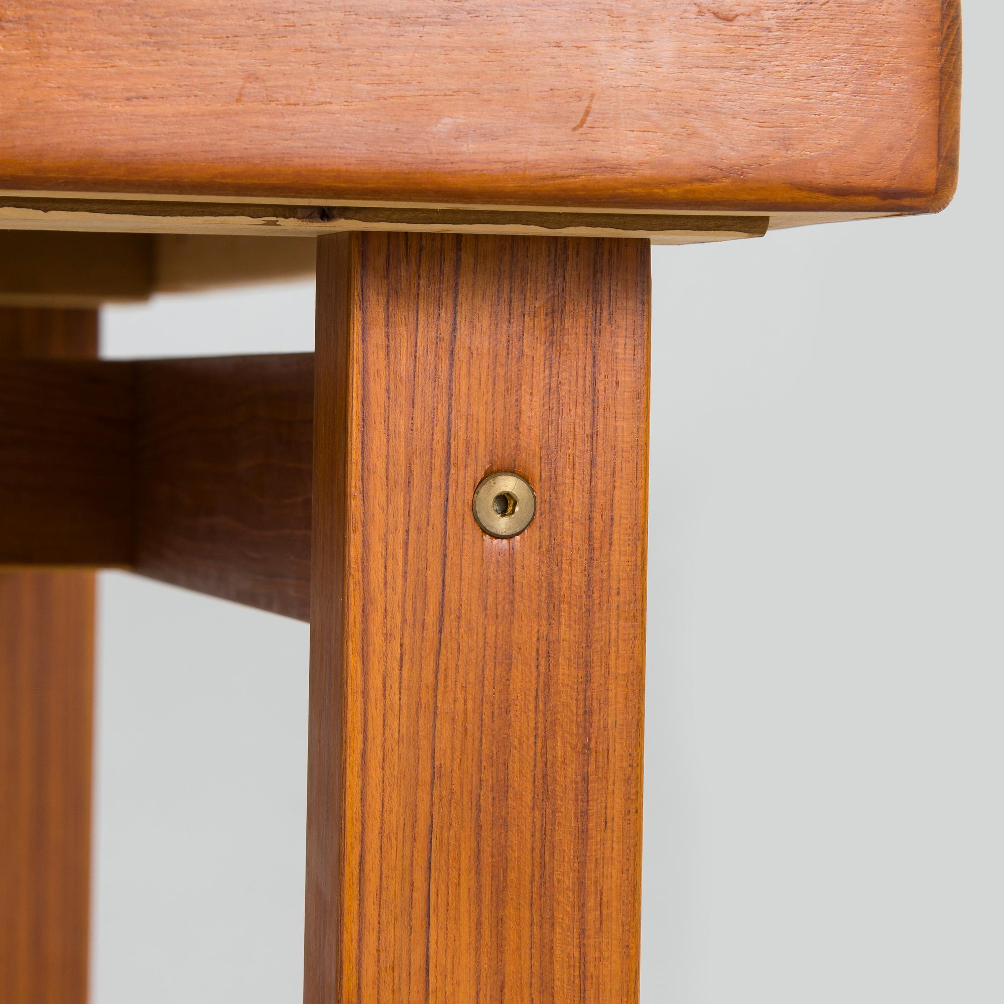A mid-20th century dining table.
