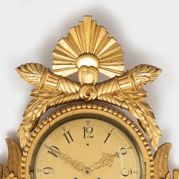 An Empire style wall clock, mid 20th century.