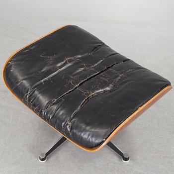 An easy chair and ottoman by Charles & Ray Eames, Herman Miller, USA, produced with licence by Hille, London.