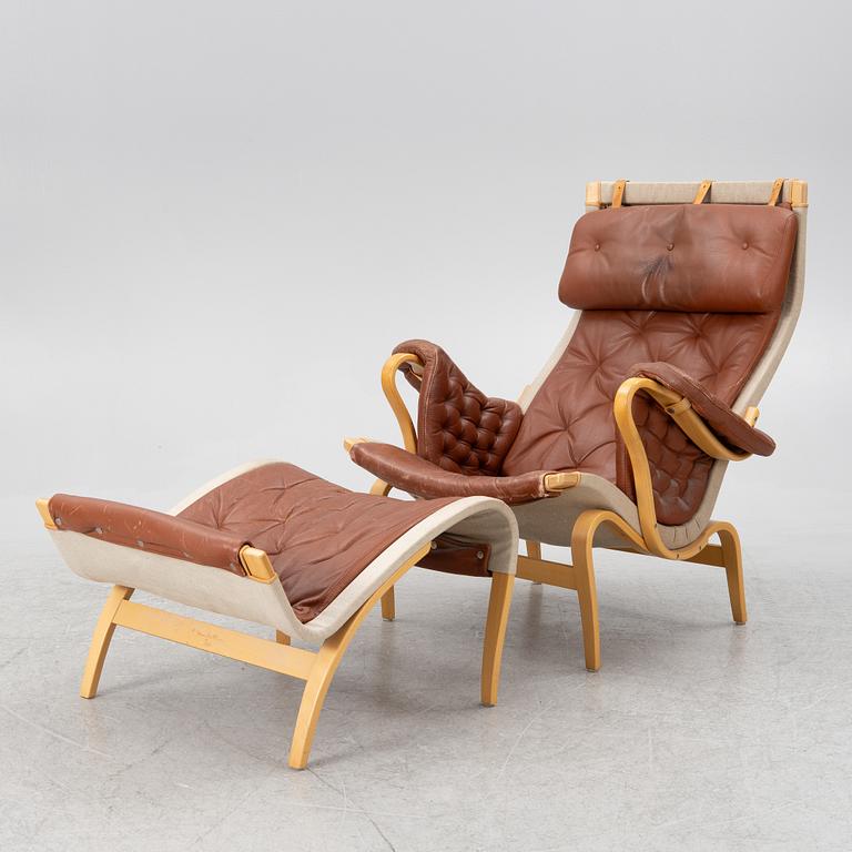 Bruno Mathsson, fåtölj med fotpall, "Pernilla", Dux.