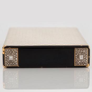 Cartier Art Deco Vanity Case 18K guld med svart emalj och baguette- och rosenslipade diamanter.