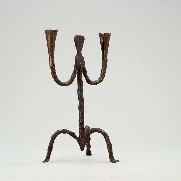 A Swedish 18th/19th century wrought-iron two-light candlestick.